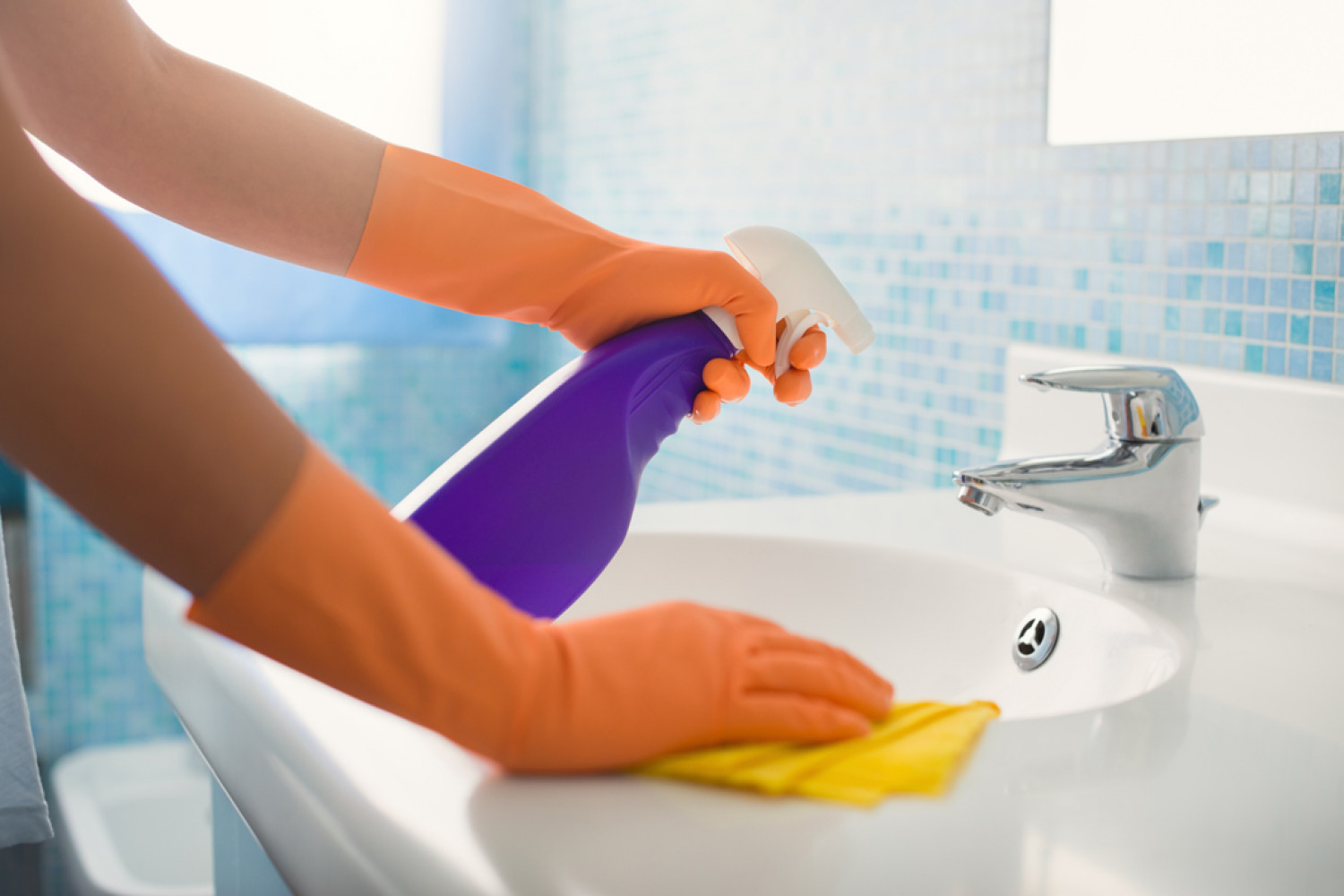 Woman-Doing-Chores-Cleaning-Ba-36893716